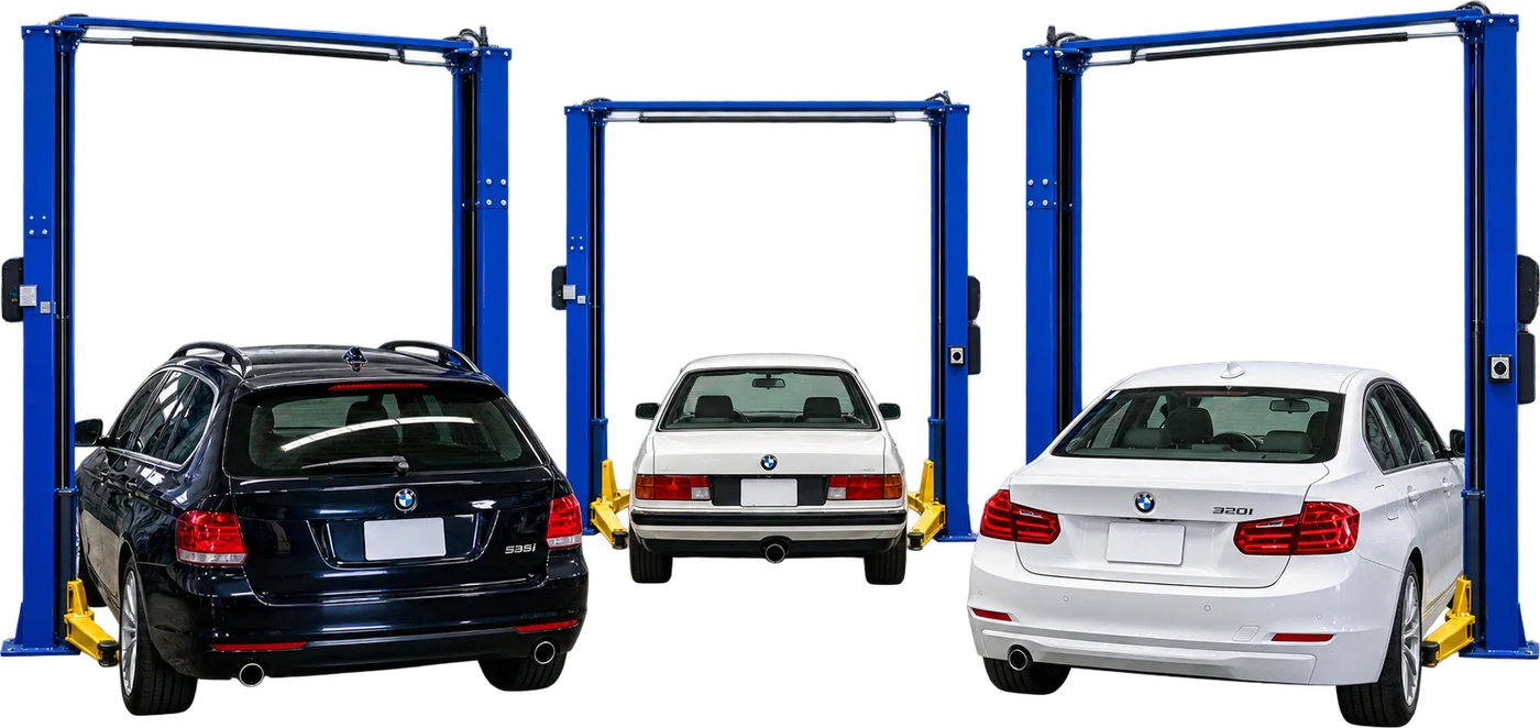 Three vehicles raised on blue two-post lifts in the TC Garage service bay